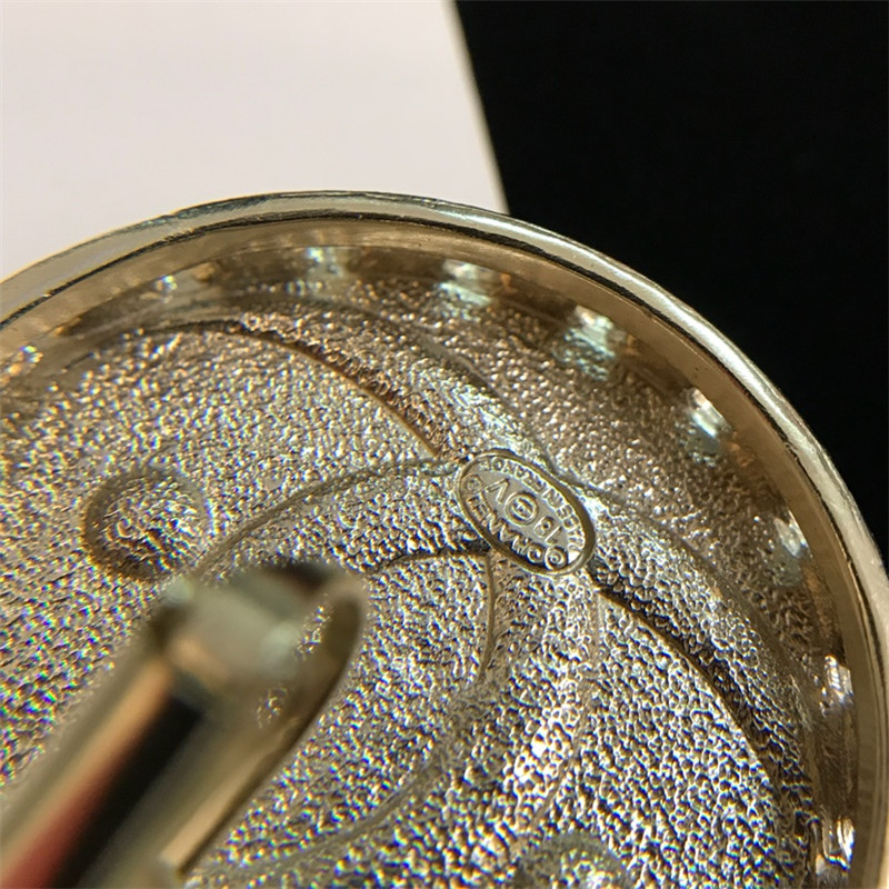 Ch**el double c logo earrings