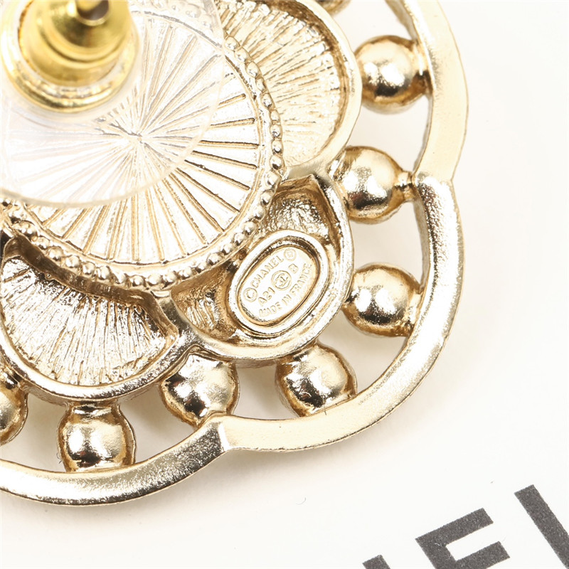 Chanel camellia franc earrings