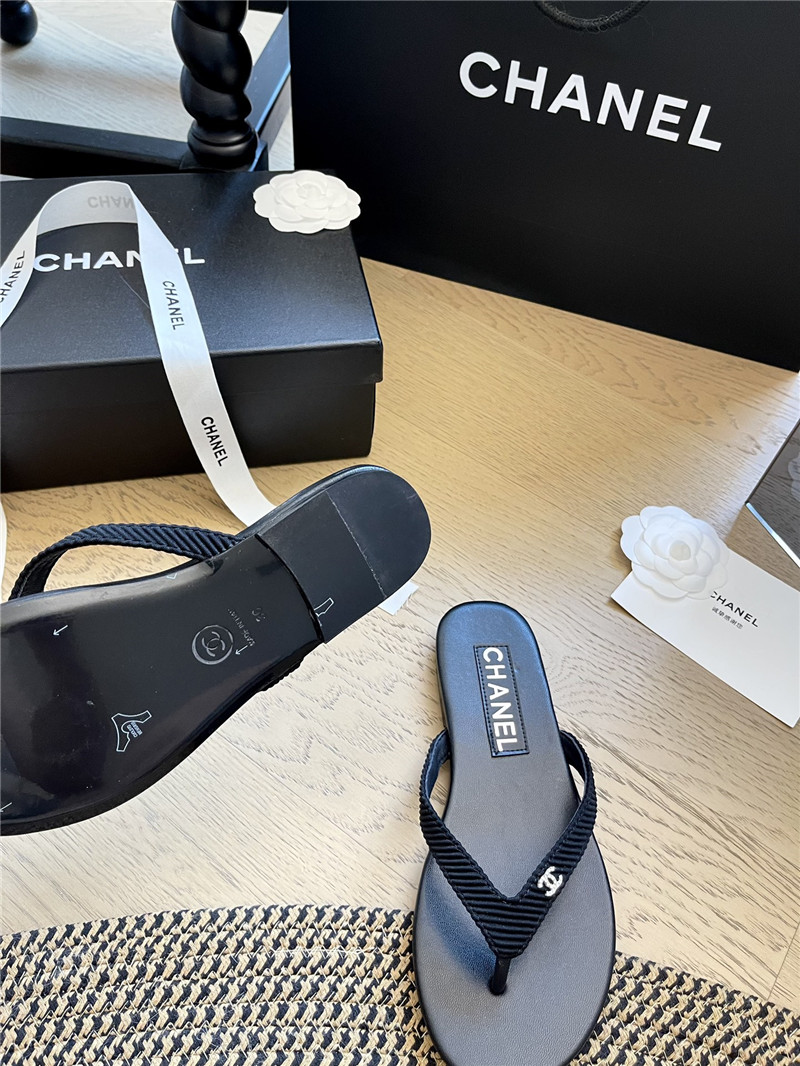 Ch**el flat black flip flops