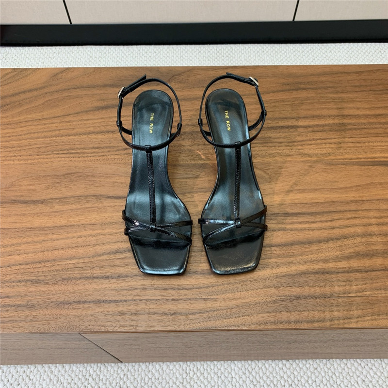 The Row Black Patent Leather Wedge Sandals