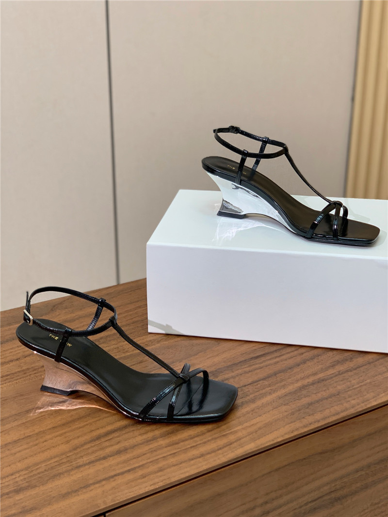 The Row Black Patent Leather Wedge Sandals