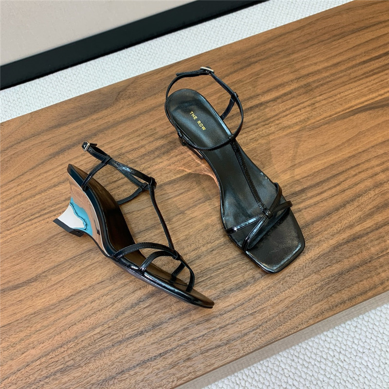 The Row Black Patent Leather Wedge Sandals