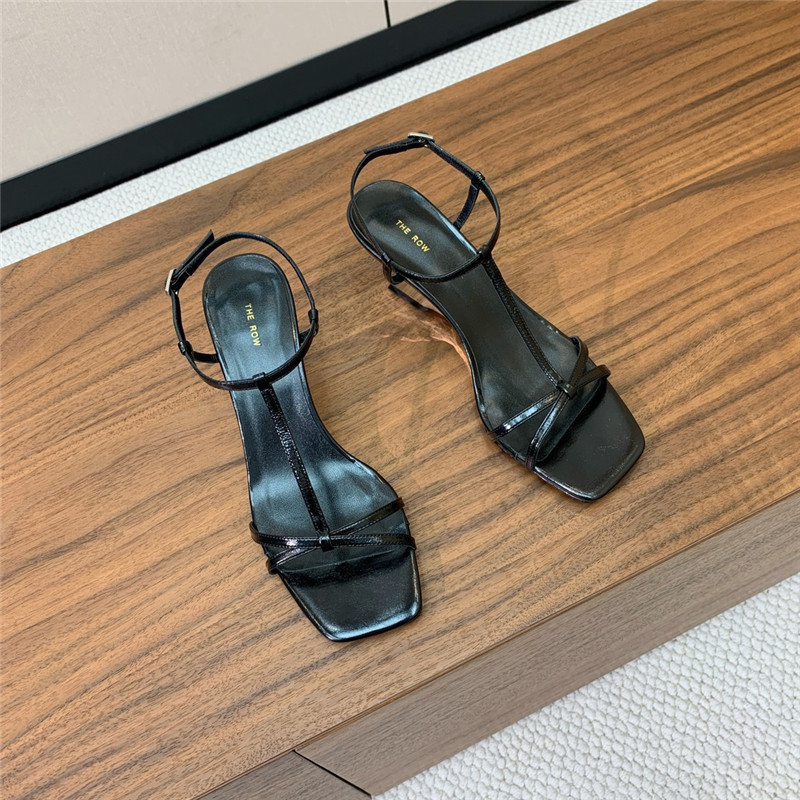 The Row Black Patent Leather Wedge Sandals