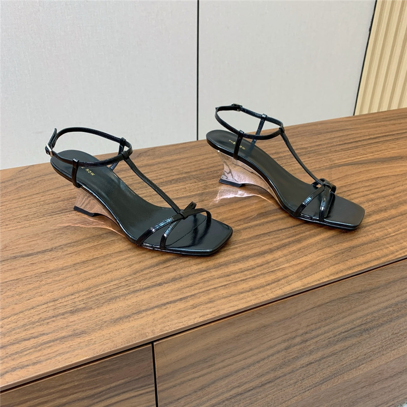 The Row Black Patent Leather Wedge Sandals