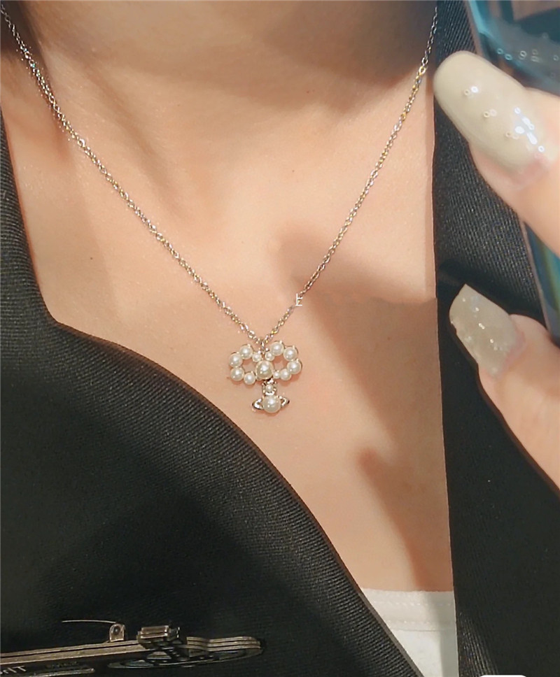 Vivienne Westwood Bow Saturn Necklace