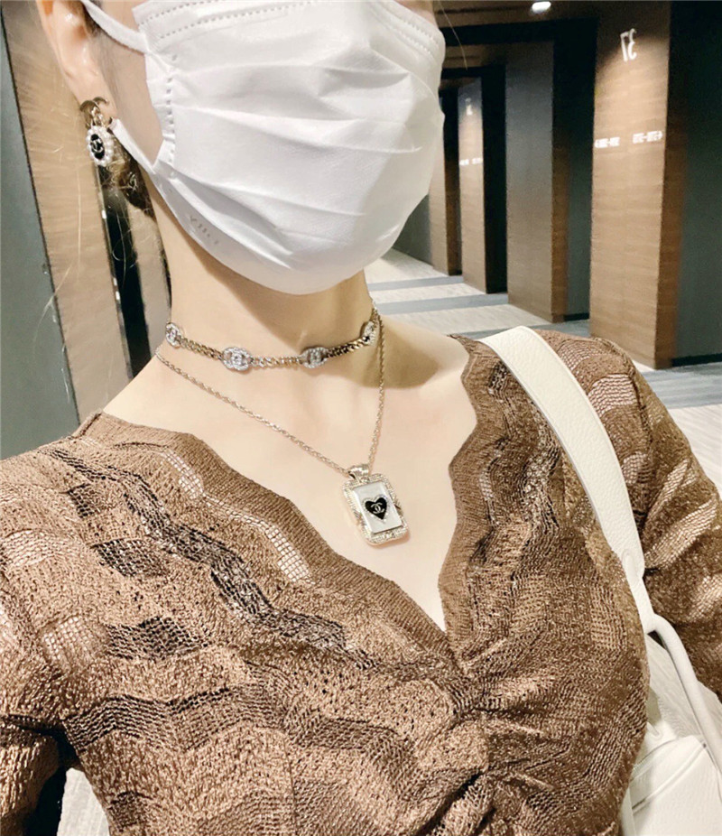 Ch**el double c lock oval pearl earrings