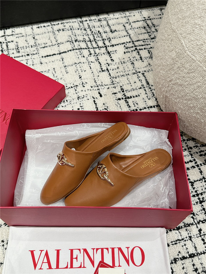 Va1e*ntin0 garavani vlogo signature leather mules in brown