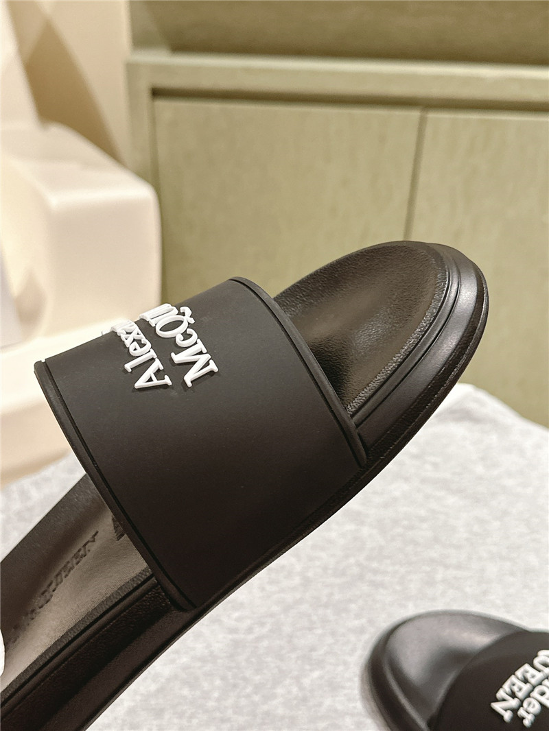 a1exa*der Mcqv*en black logo slide