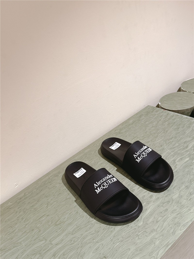 a1exa*der Mcqv*en black logo slide