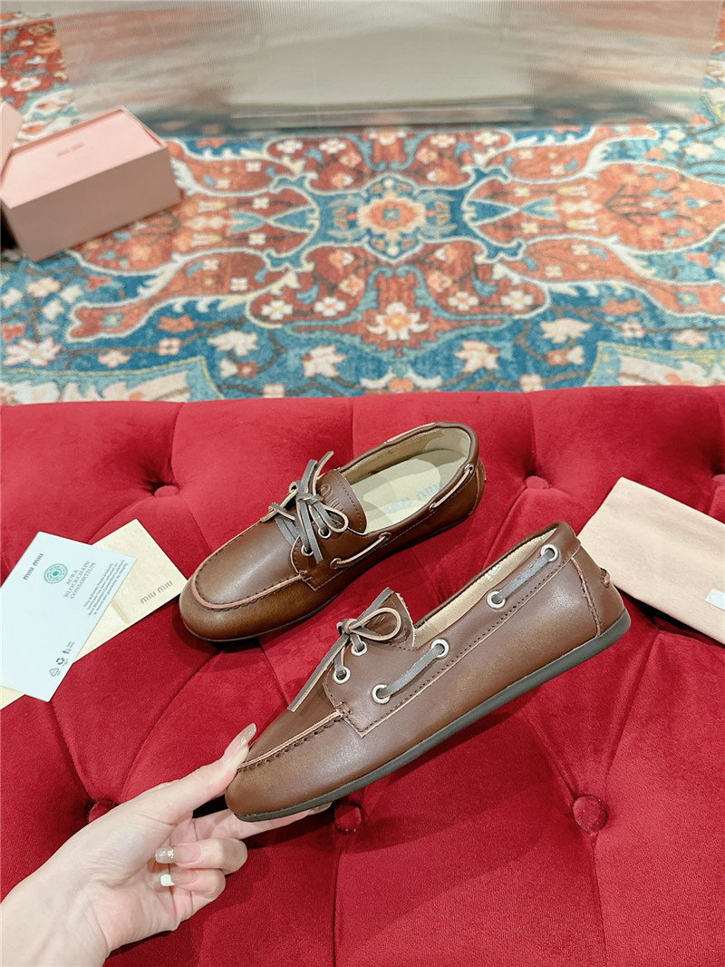 Miu Miu Bleached Leather Loafers