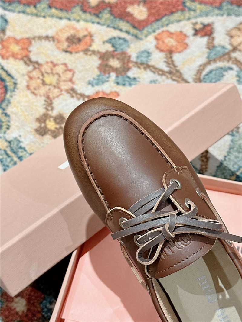 Miu Miu Bleached Leather Loafers