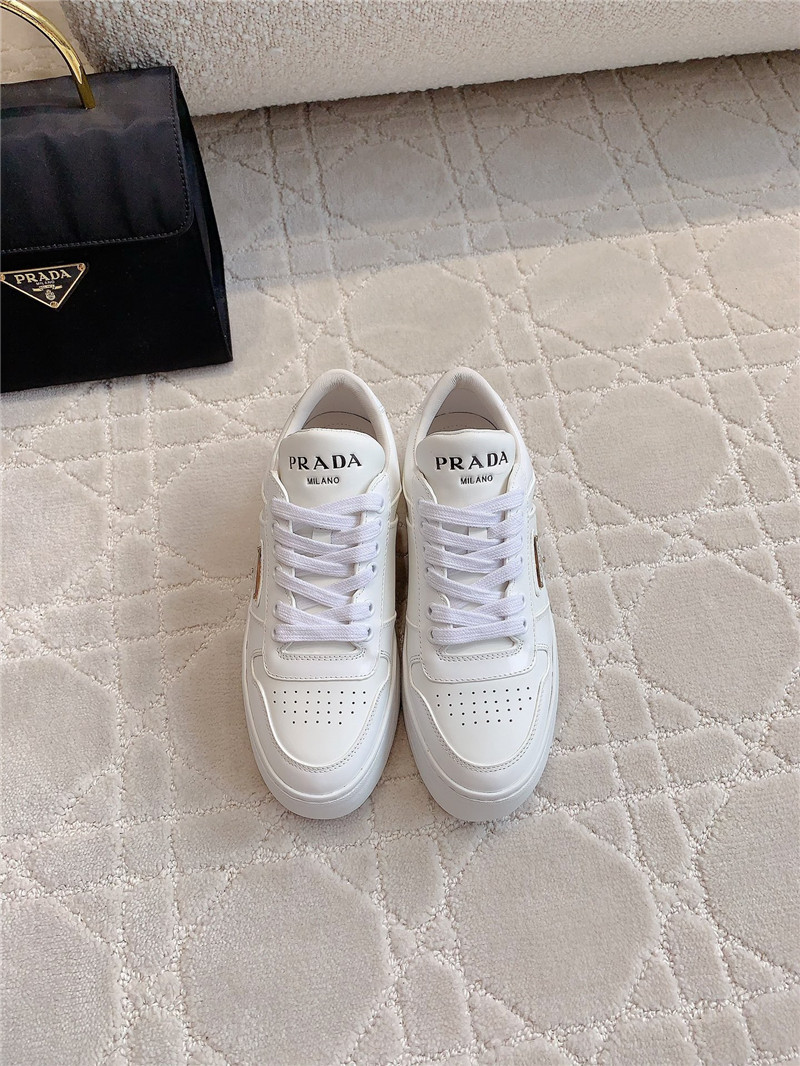 Pra*a triangle-logo white lace-up sneakers