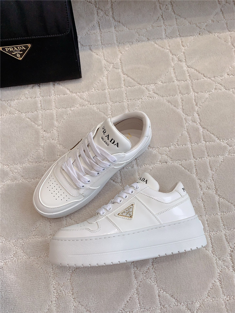 Pra*a triangle-logo white lace-up sneakers