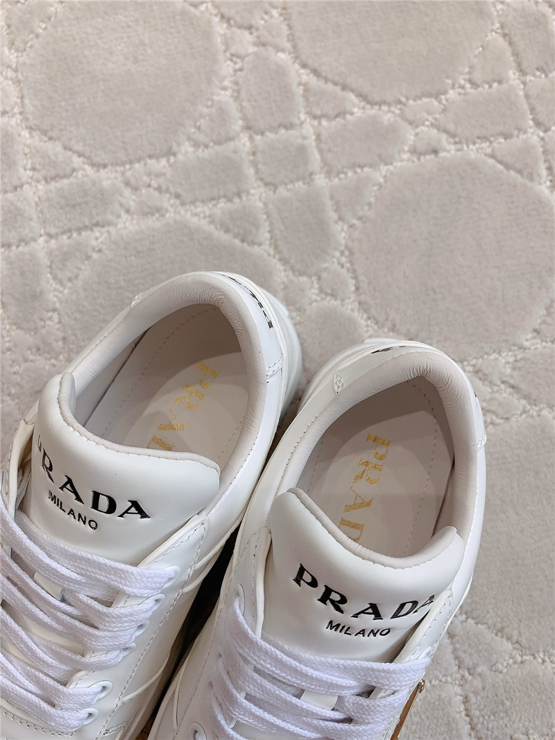Pra*a triangle-logo white lace-up sneakers