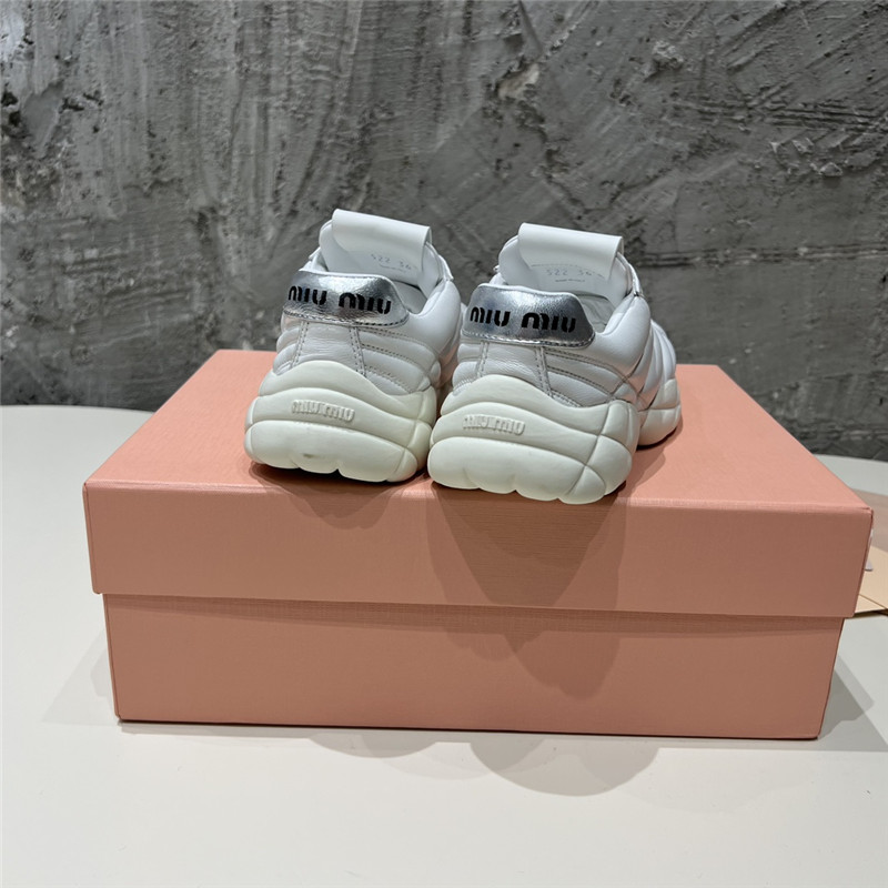 Miu Miu Quilted Leather Lace-up Sneakers