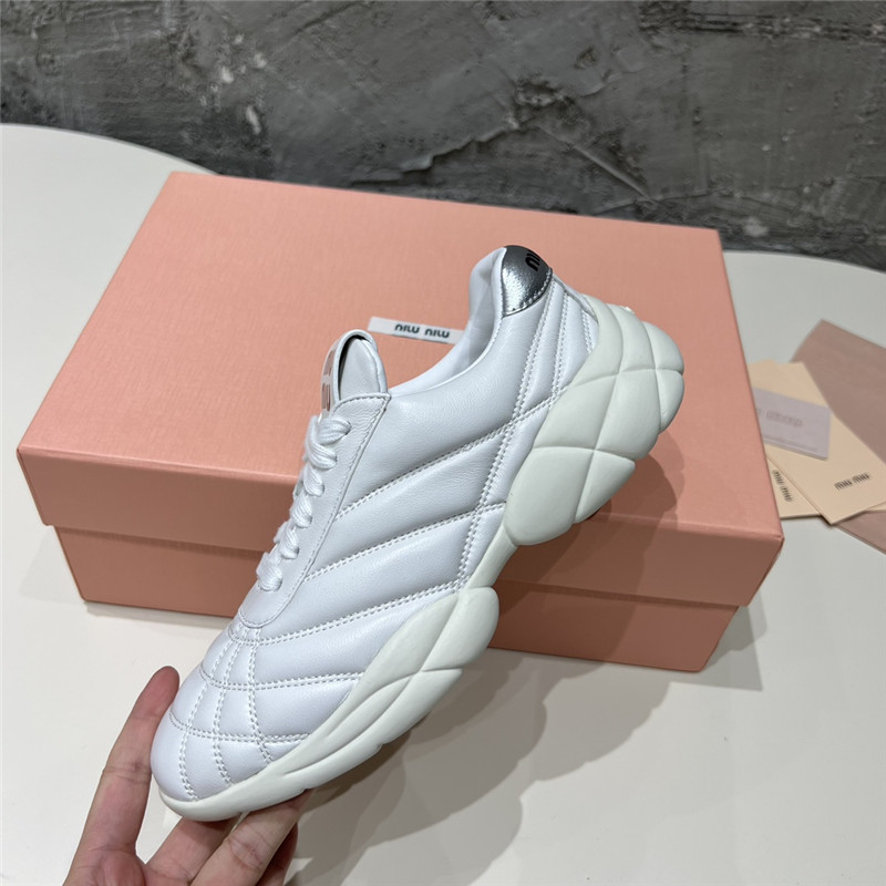 Miu Miu Quilted Leather Lace-up Sneakers