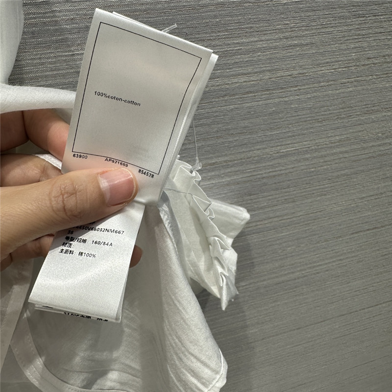 Ch**el white ruffled collar sleeveless shirt