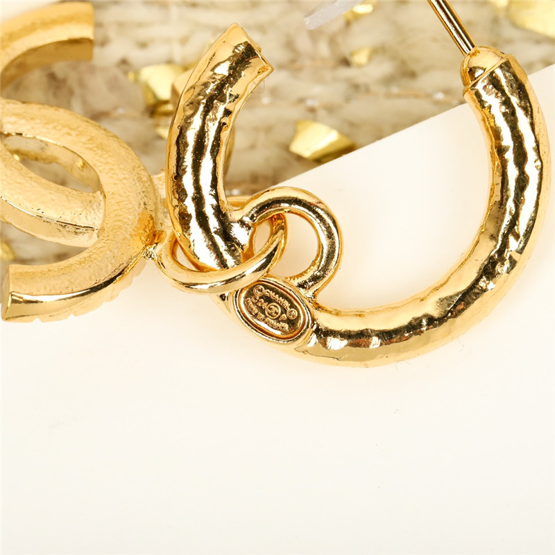 Ch**el embossed double c earrings