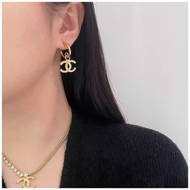 Ch**el embossed double c earrings