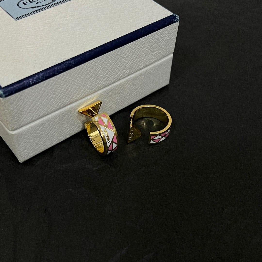 Pra*a triangle earrings