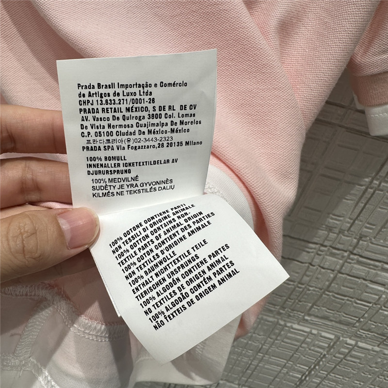 Pra*a fake two-piece top + pleated skirt replica d&g clothing