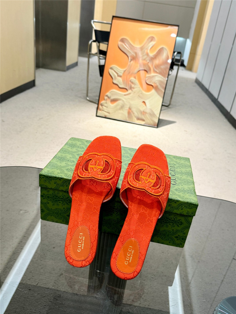 Gvc*1 interlocking g slide sandal in orange gg canvas