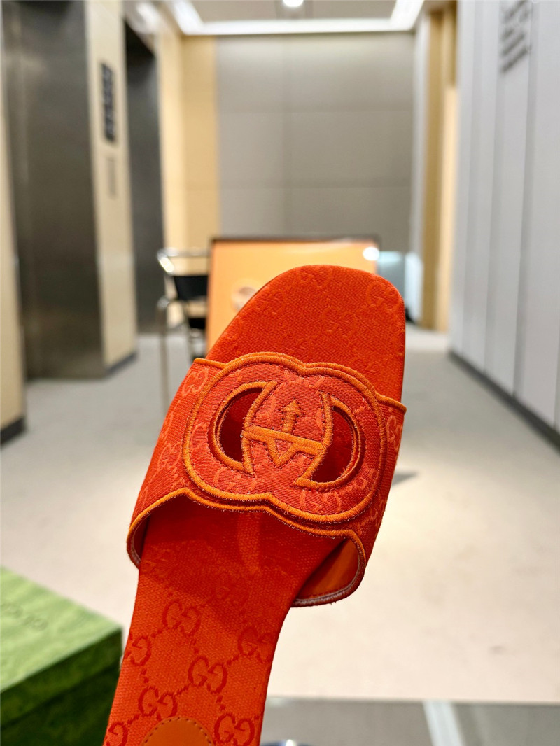 Gvc*1 interlocking g slide sandal in orange gg canvas