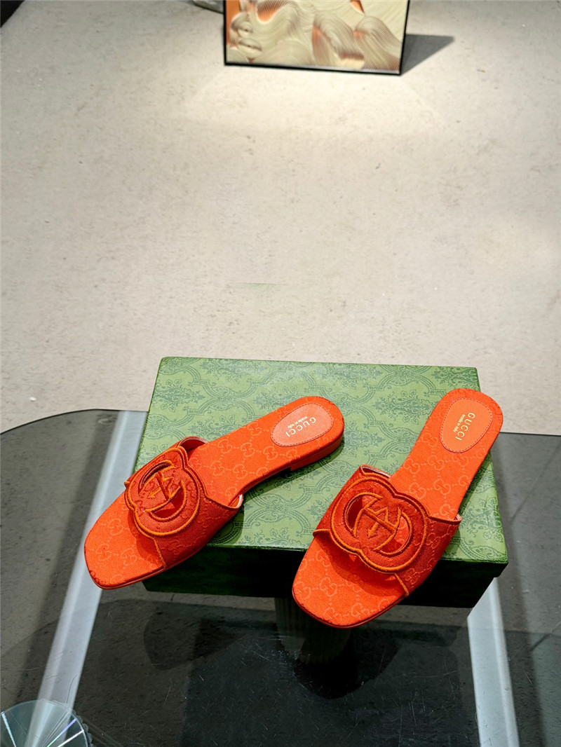 Gvc*1 interlocking g slide sandal in orange gg canvas