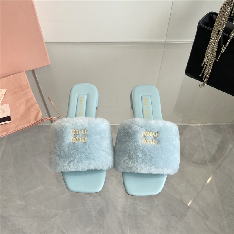 Miu Miu Blue Matelassé Fur Slides with Metal Lettering