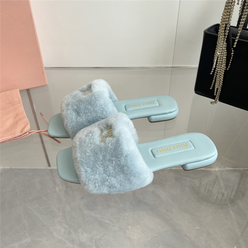 Miu Miu Blue Matelassé Fur Slides with Metal Lettering