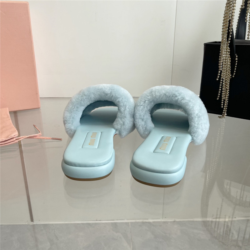 Miu Miu Blue Matelassé Fur Slides with Metal Lettering