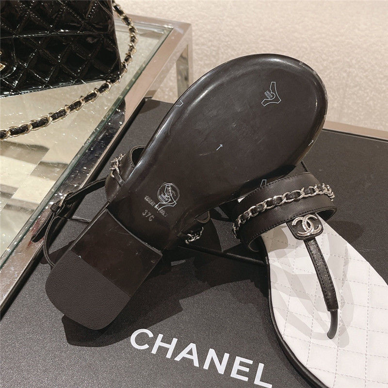 Ch**el quilted t-strap chain flat sandals black and white
