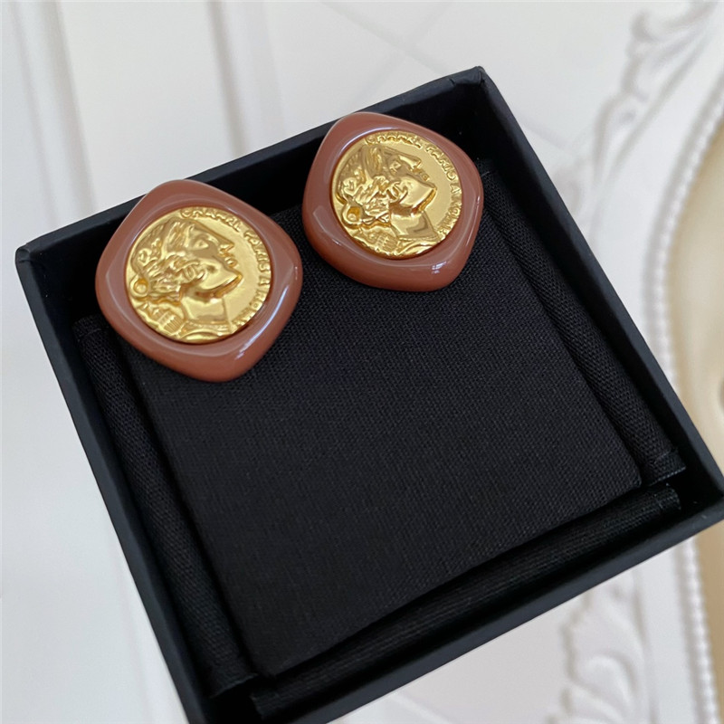 Ch**el vintage coin earrings