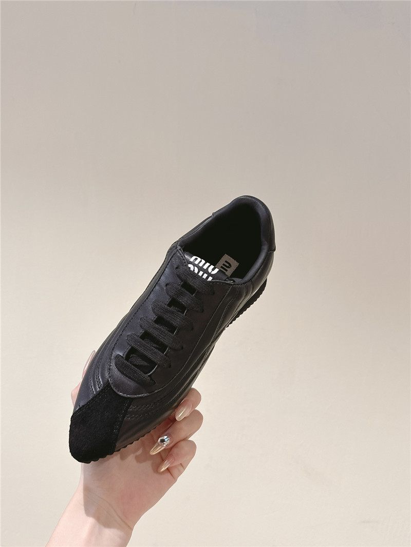 Miu Miu Point Toe Quilted Leather Sneakers in Black
