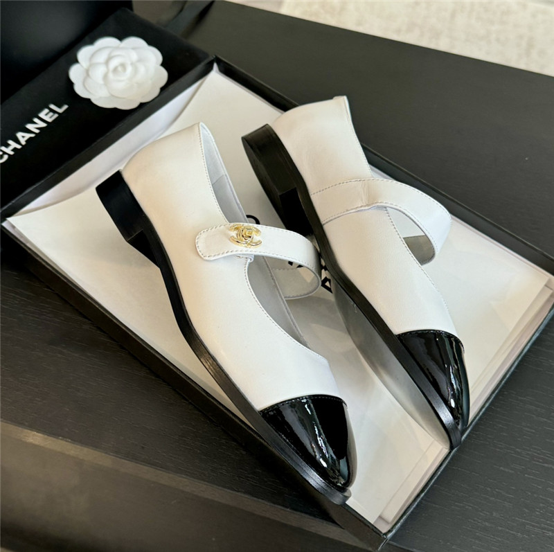 Ch**el gold interlock mary janes in white and black calfskin