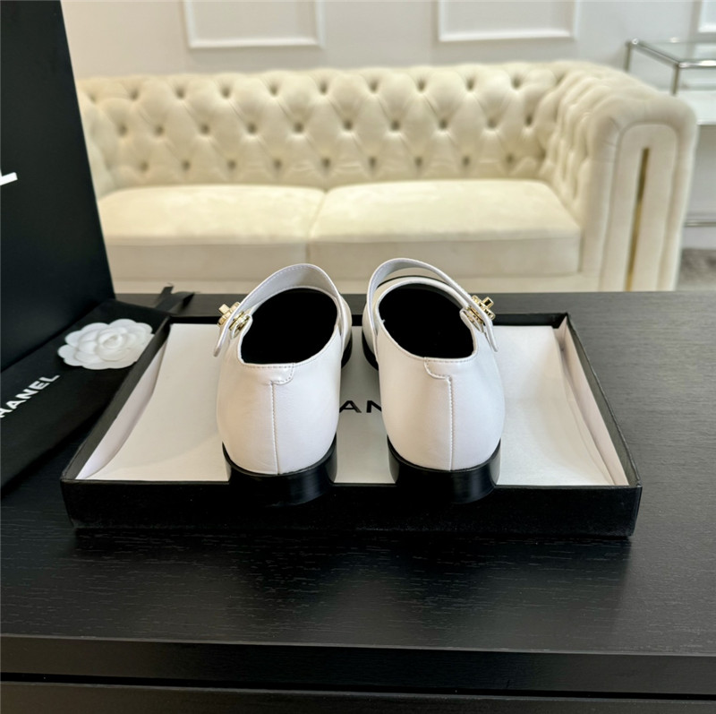 Ch**el gold interlock mary janes in white and black calfskin