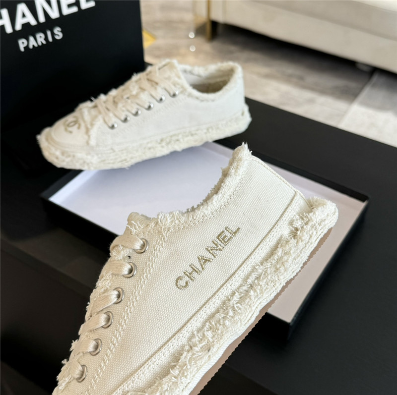 Ch**el lace-up canvas sneakers in white