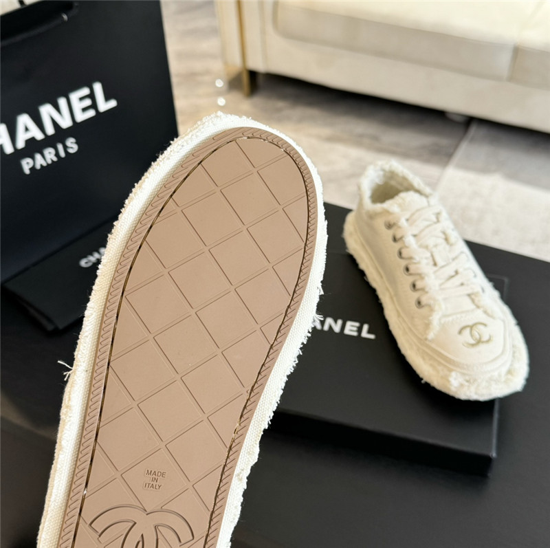 Ch**el lace-up canvas sneakers in white