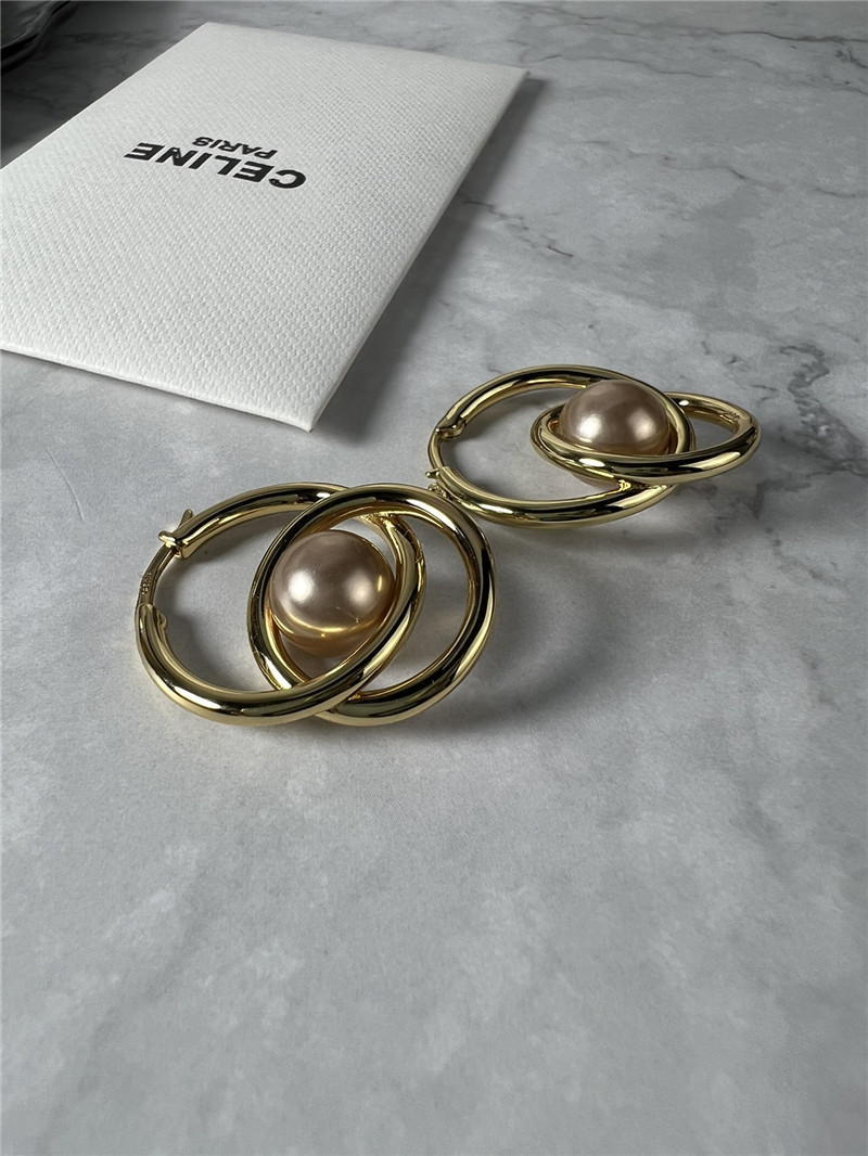 Ce1i*e double loop pearl earrings