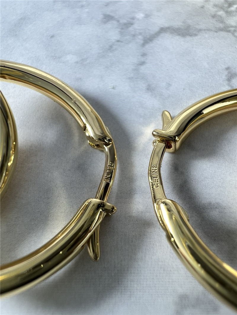 Ce1i*e double loop pearl earrings