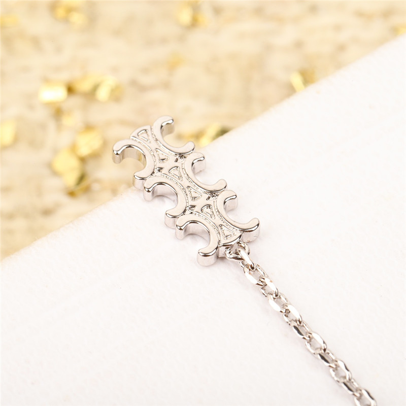 Ce1i*e three-dimensional arc de triomphe earrings