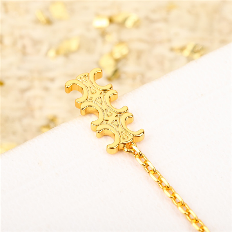 Ce1i*e three-dimensional arc de triomphe earrings