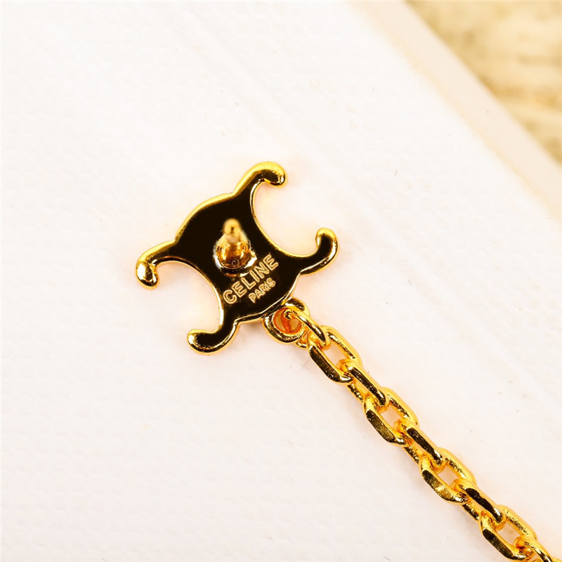 Ce1i*e three-dimensional arc de triomphe pearl earrings