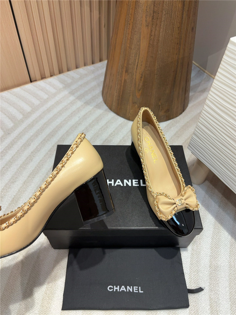 Ch**el bow chain trim ballet pumps in beige and black leather