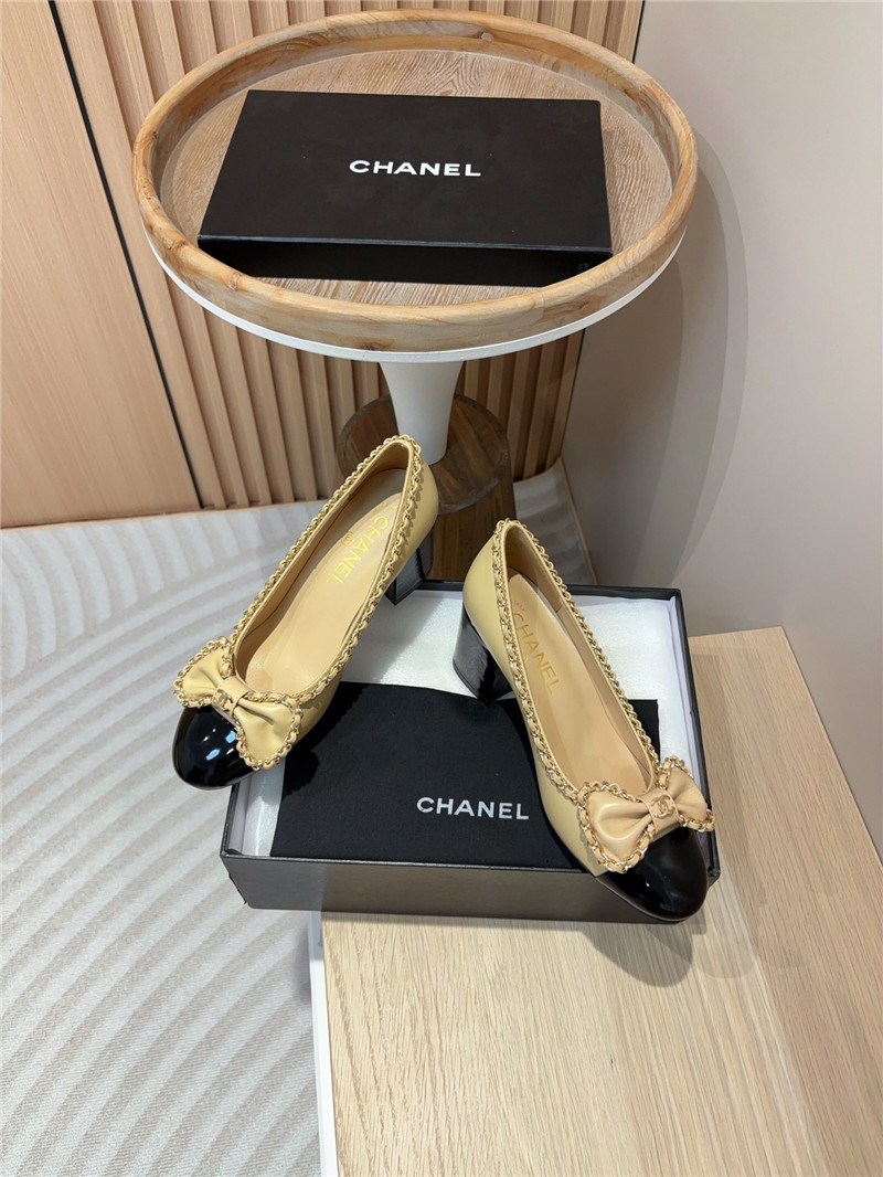 Ch**el bow chain trim ballet pumps in beige and black leather