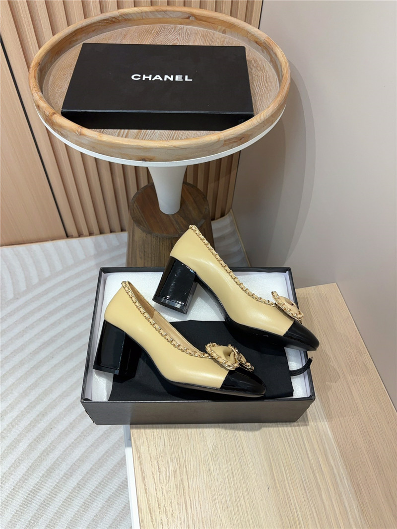 Ch**el bow chain trim ballet pumps in beige and black leather