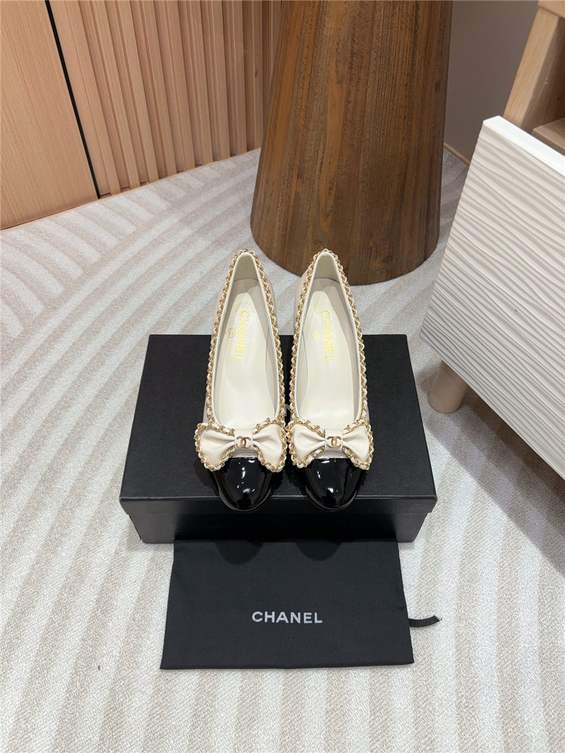 Ch**el bow chain trim ballet pumps in white and black leather