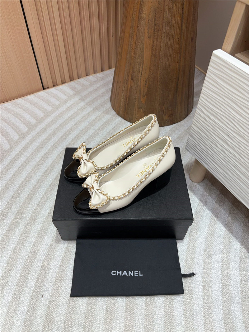 Ch**el bow chain trim ballet pumps in white and black leather