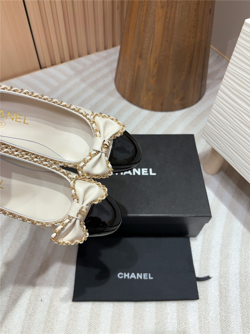 Ch**el bow chain trim ballet pumps in white and black leather