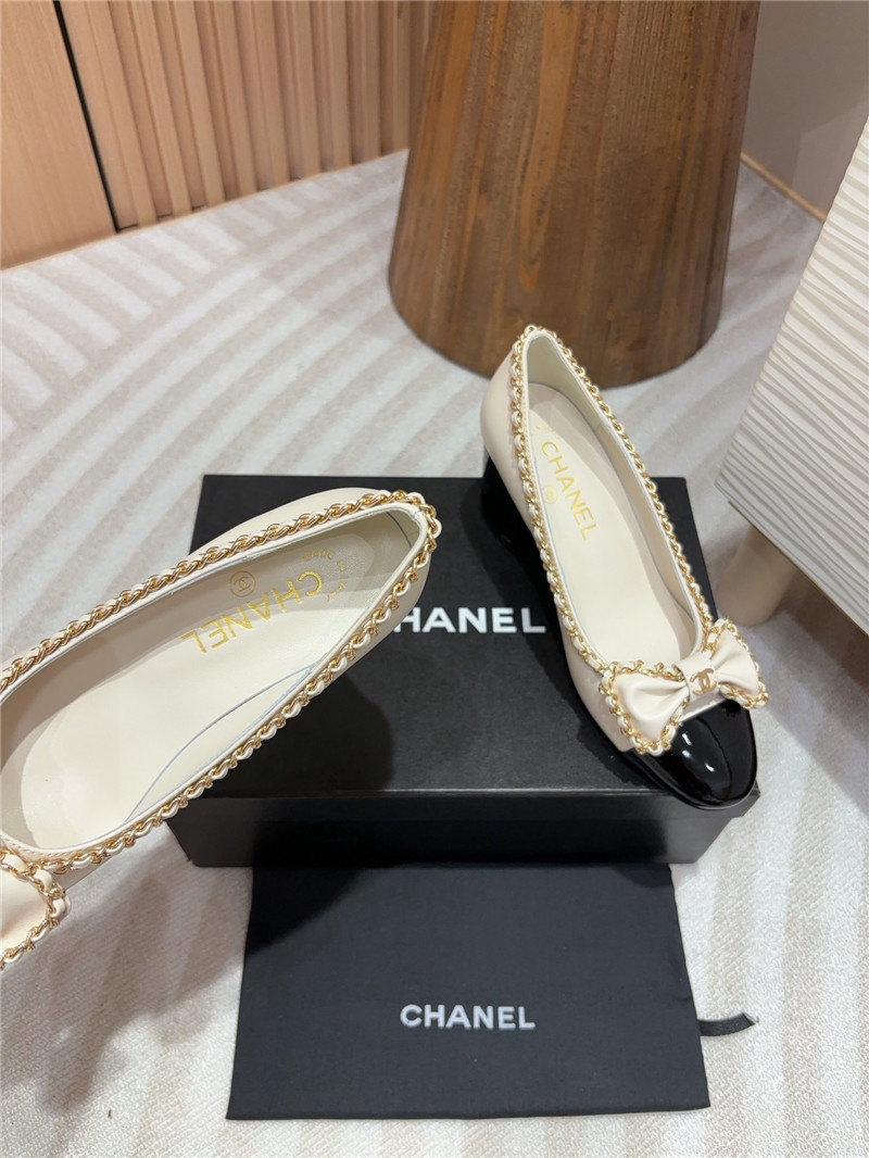 Ch**el bow chain trim ballet pumps in white and black leather
